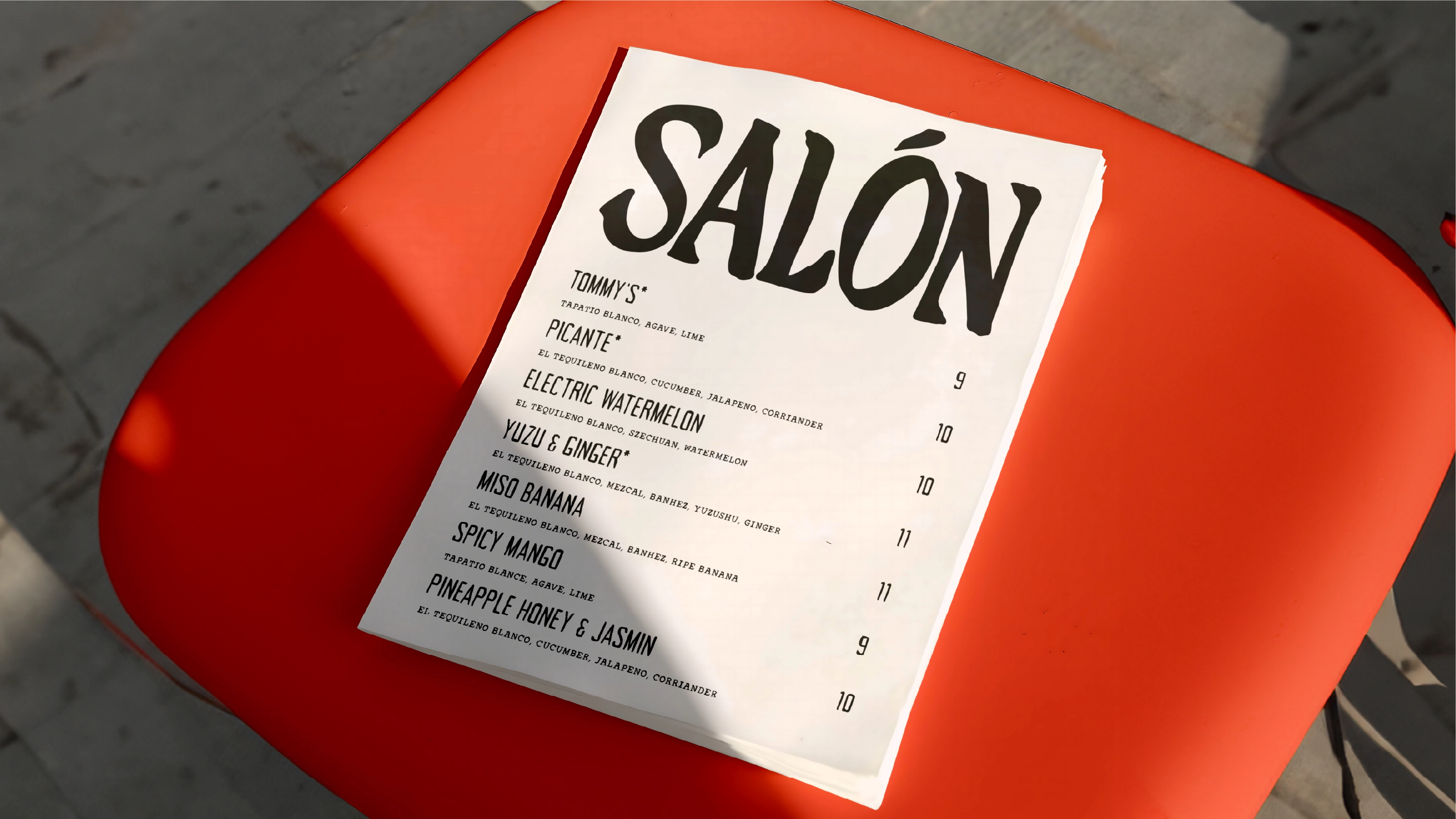 A mockup for the cocktail and food menu design for Salon Madre, created during their brand identity design project by Sanna Studio