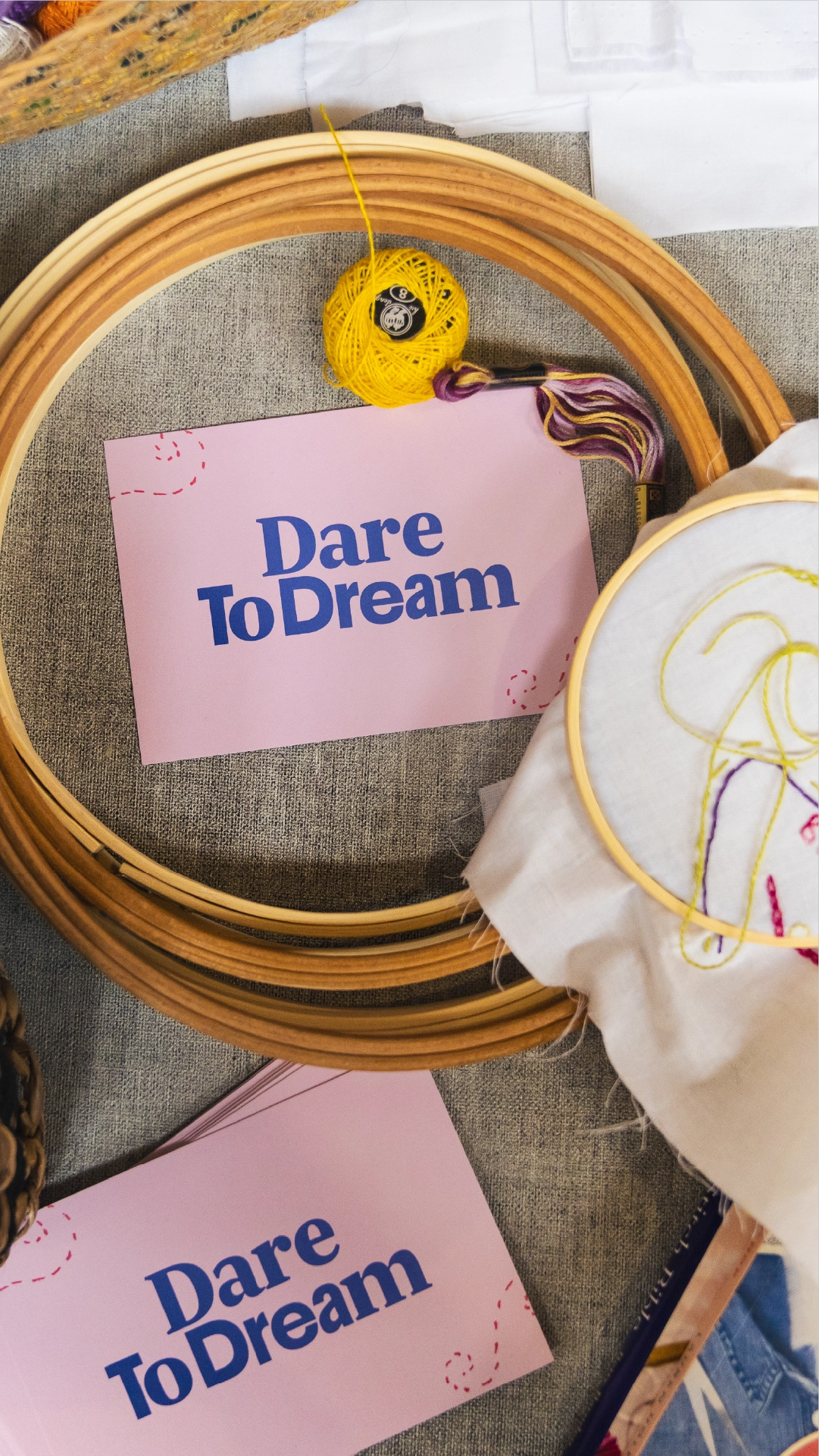 Photograph of business cards featuring the Dare To Dream sub branding within the Derbyshire Makes project, by Sanna Studio