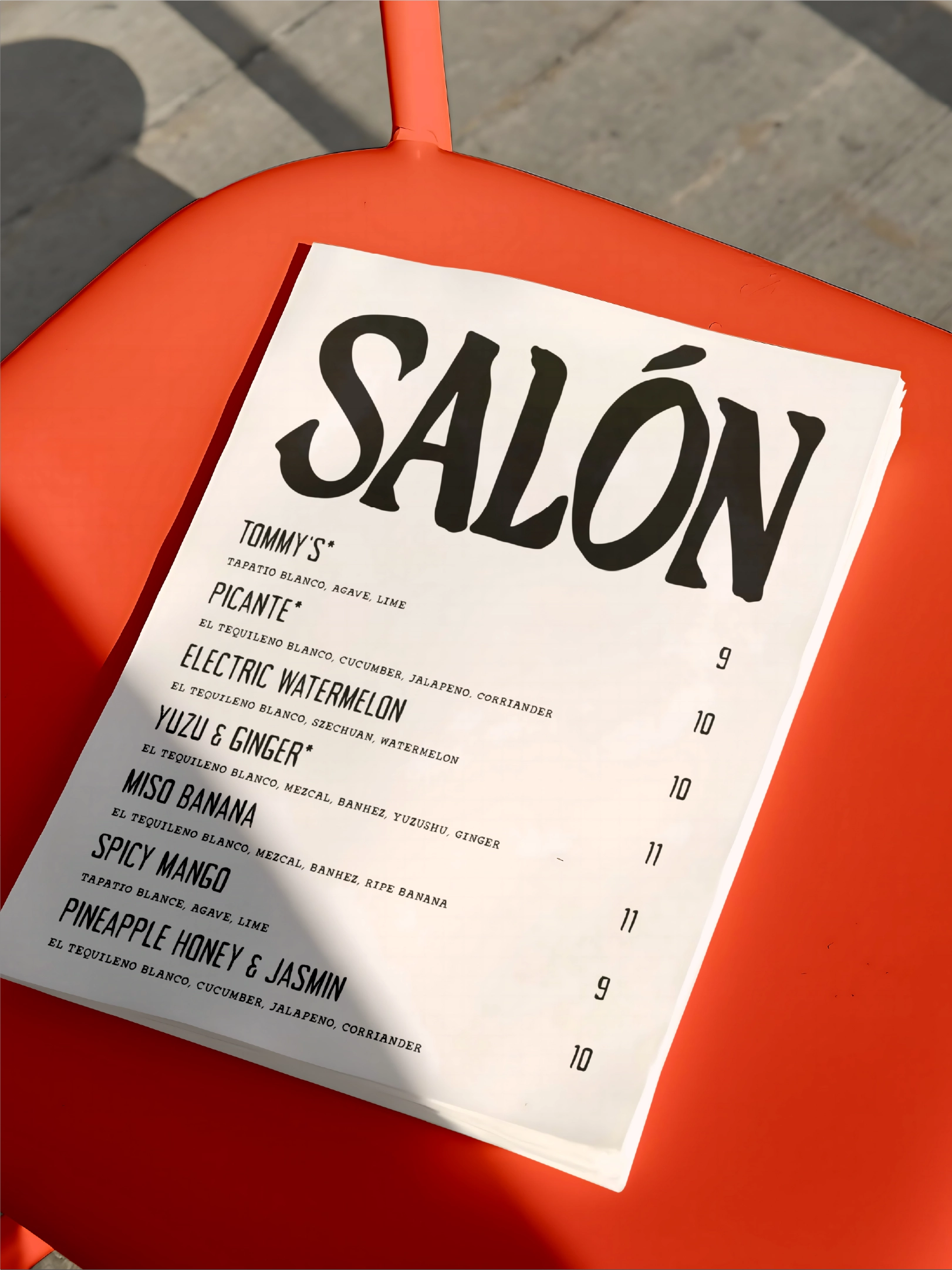 A mockup for the cocktail and food menu design for Salon Madre, created during their brand identity design project by Sanna Studio