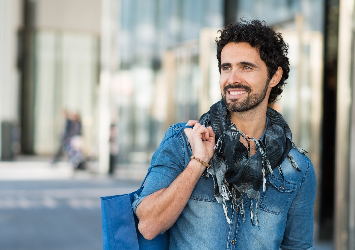 Man shopping outdoor mall.