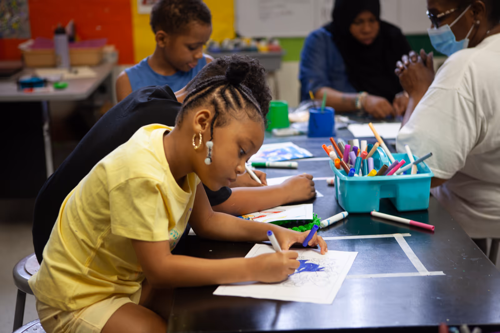 Student drawing in art class during Fairwold Academy commercial filmed by Camos Media.