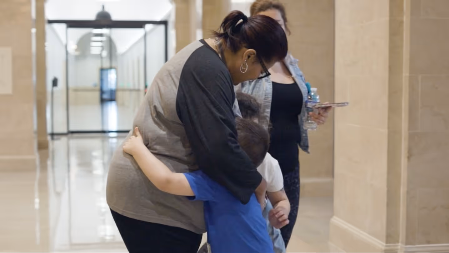 Child and nurse share a hug during NNCC commercial filmed by Camos Media.