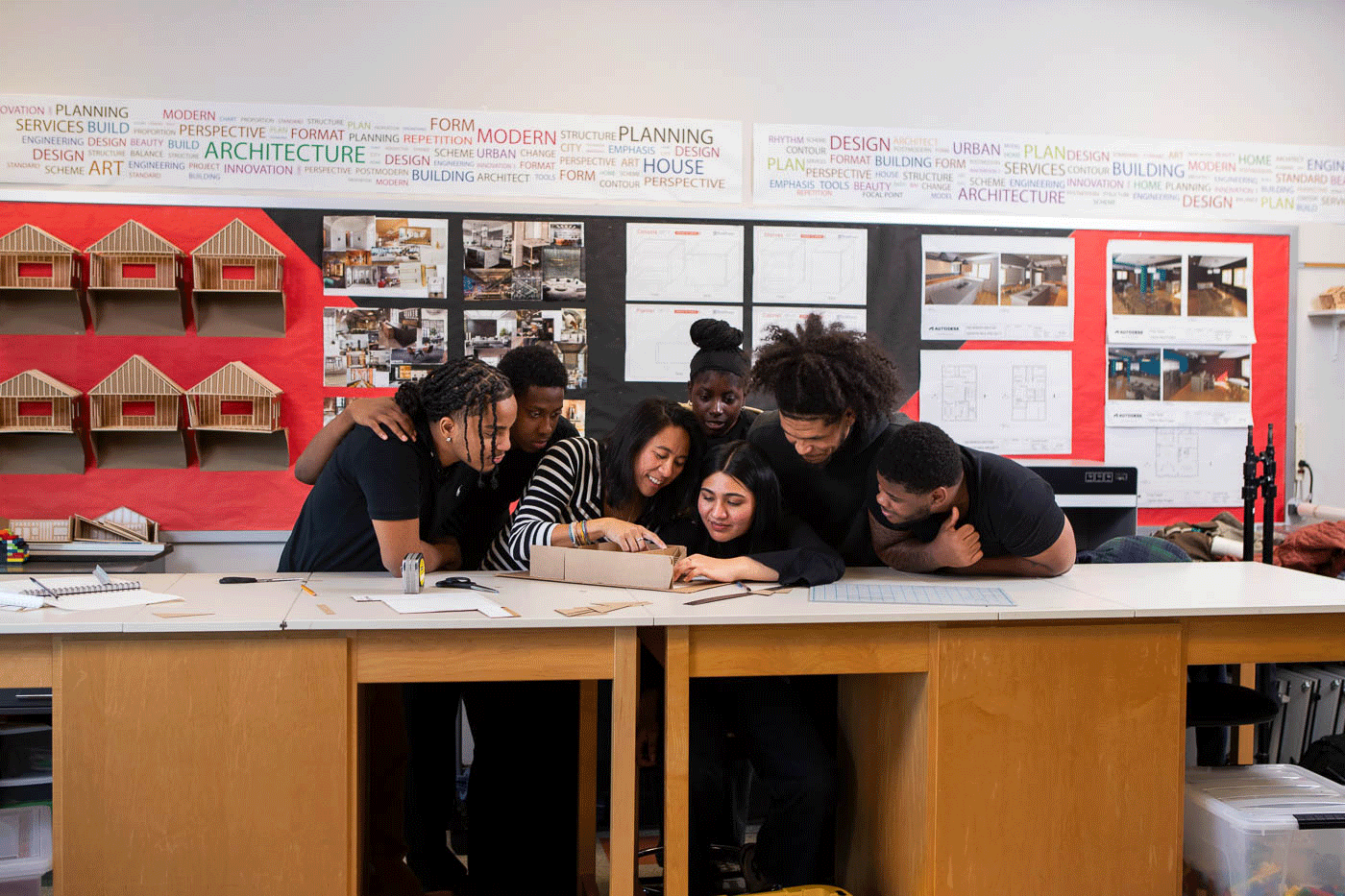 Architecture teacher and students building models in the I AM SDP commercial filmed by Camos Media. 