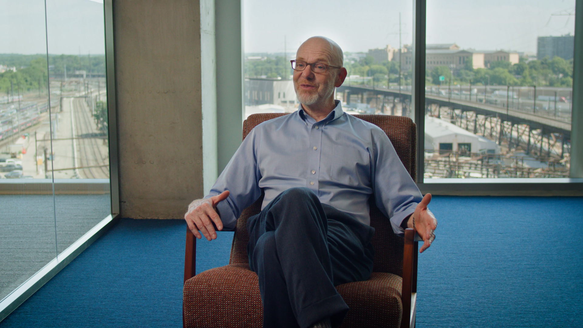 Film still of an executive being interviewed inside FS Building for Gensler project.