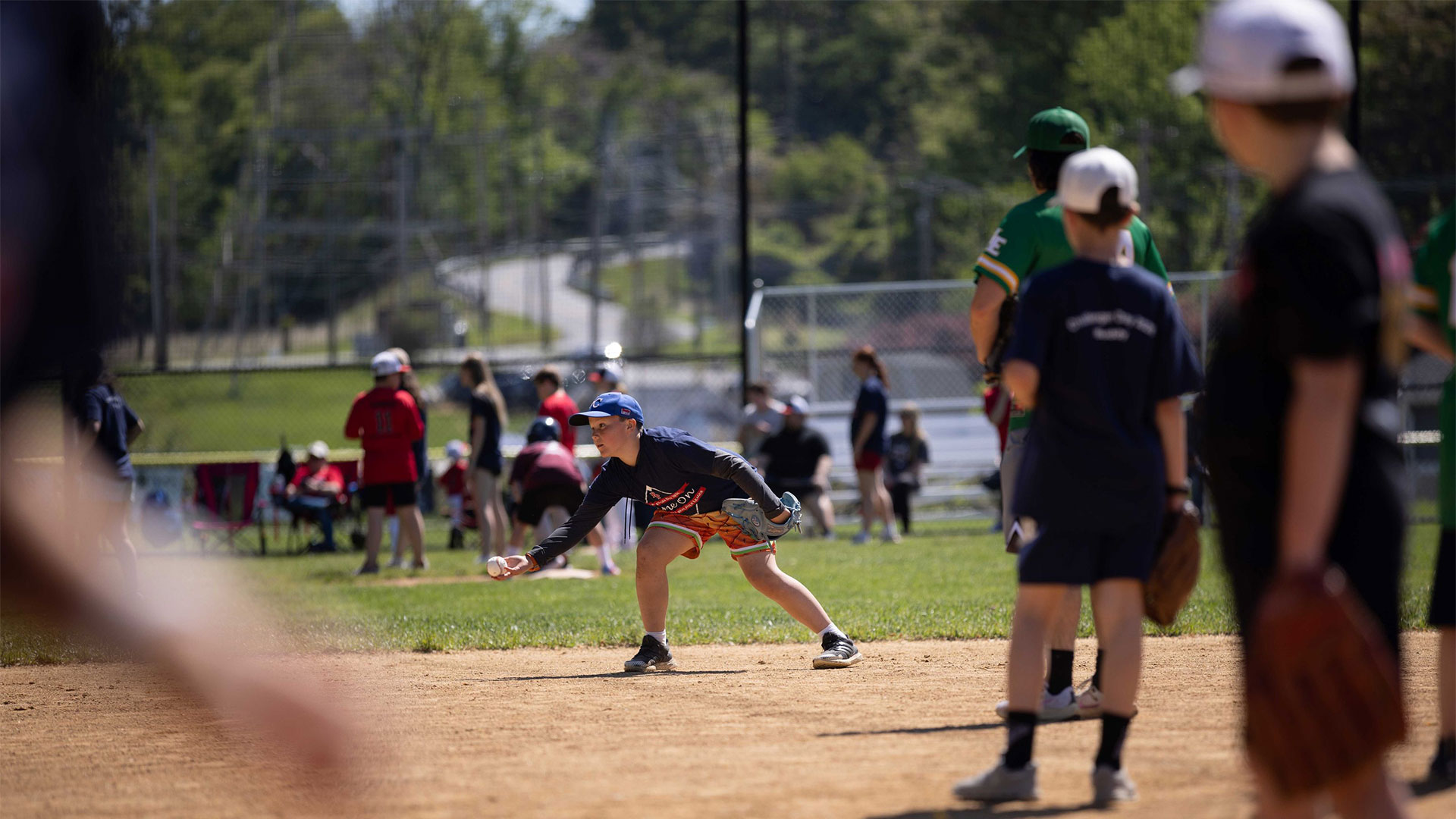 Young baseball player throwing a ball during Berwyn Paoli Little League Challenger Day.