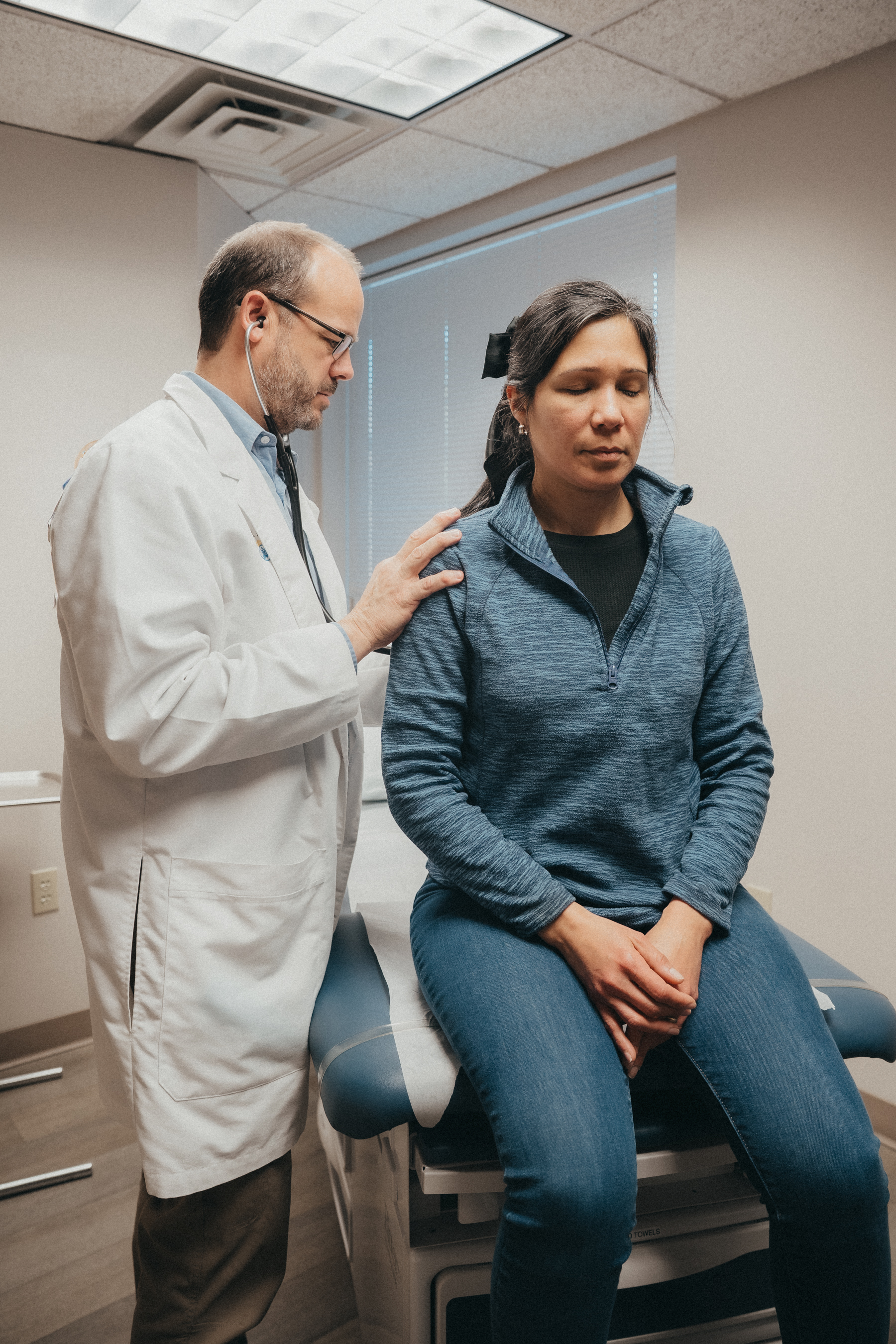 Napro doctor helping female patient understand her fertility