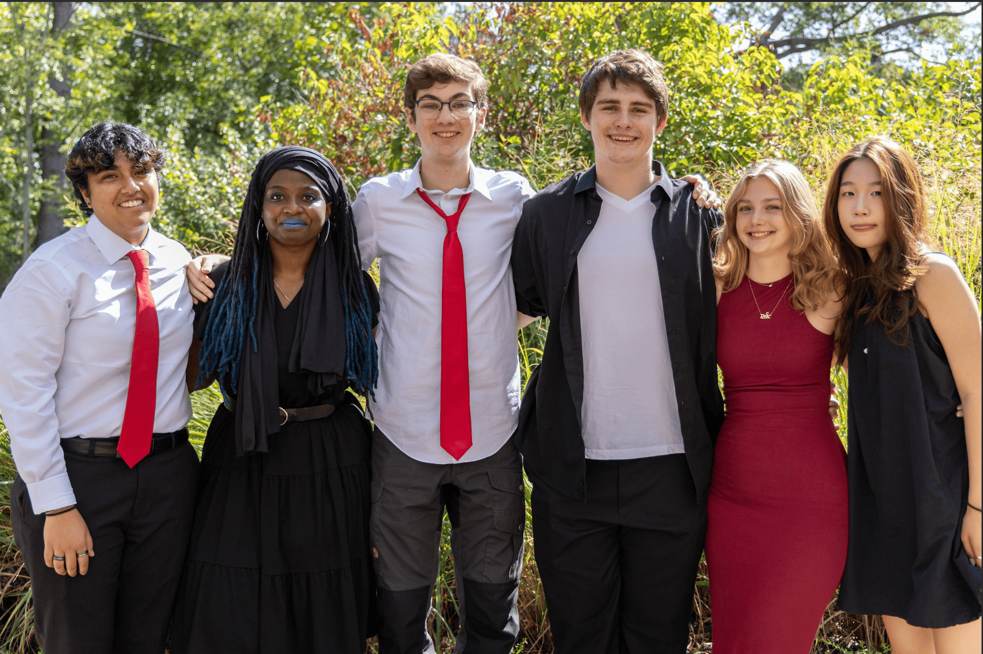 Photo of the Amateurs smiling together