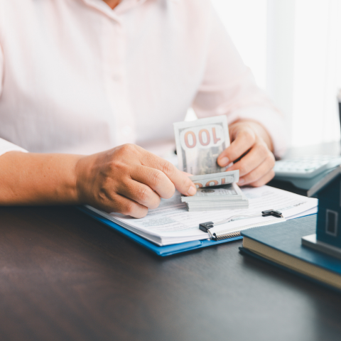Customer reviewing payday loan paperwork with a financial professional