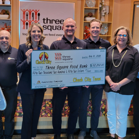 Check City volunteers at the 2024 Three Square food drive