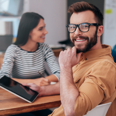 image of a smiling man who appears to have confidence of his knowledge of loans