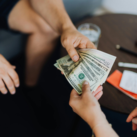 Peer-to-peer lending concept shown with connected wooden blocks