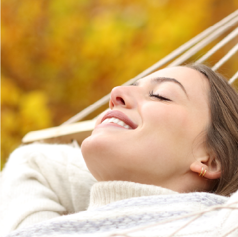 relaxed woman in a hammock