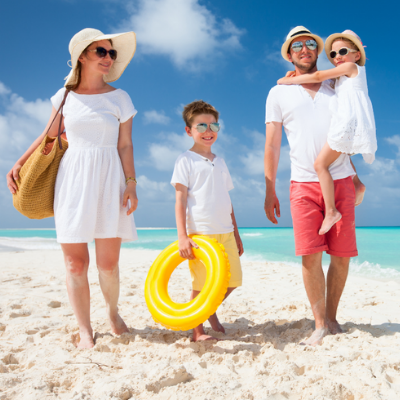 family walking on the beach