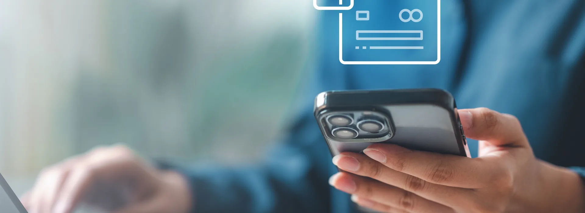 Person freezing a credit card through a mobile banking app