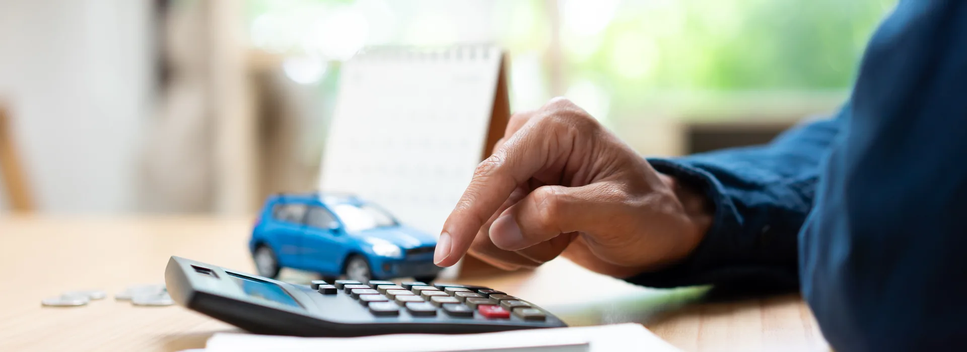 Calculator, coins, car model