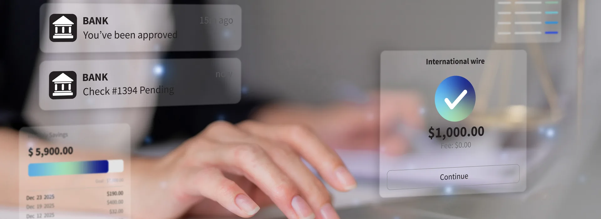 Woman completing an international wire transfer on a laptop