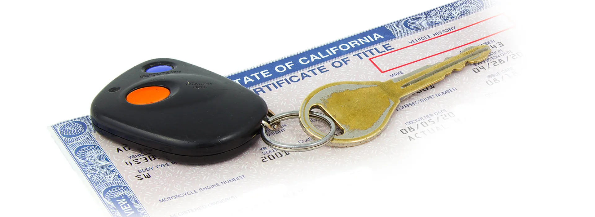 Worn car key on California certificate of Title with crean histo