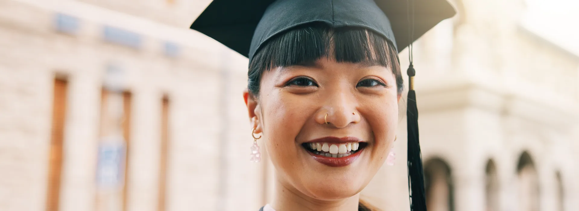 College student smiling on campus