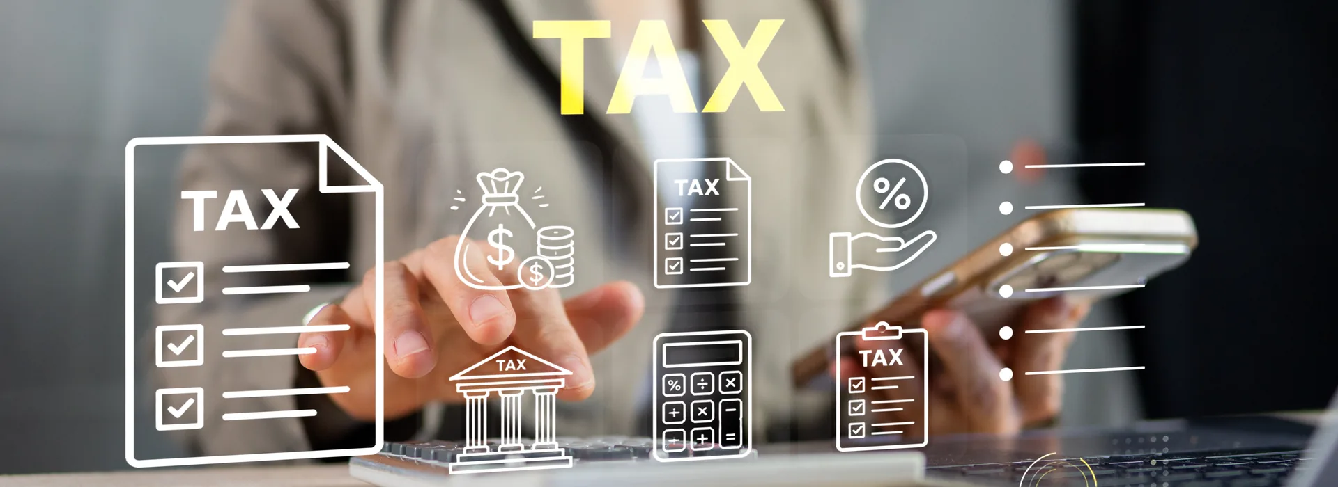 Businesswoman calculating taxes using a smartphone and calculator
