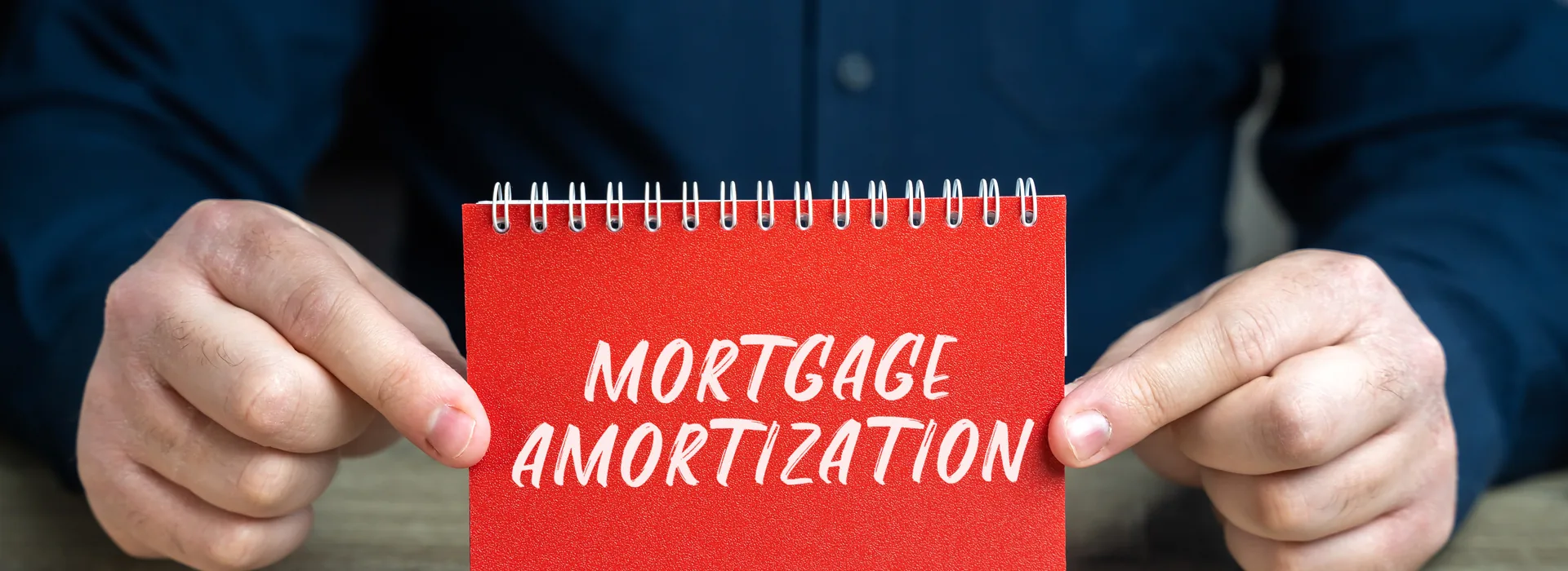 Mortgage amortization plan reviewed with a loan payment schedule