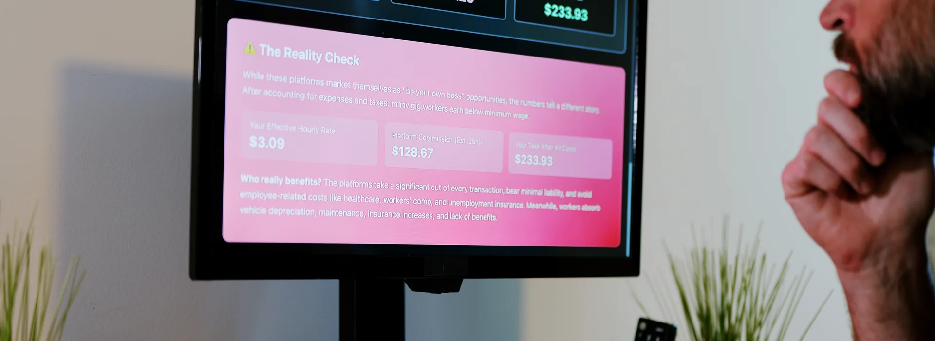 Freelancer reviewing side-hustle income and expenses on a computer