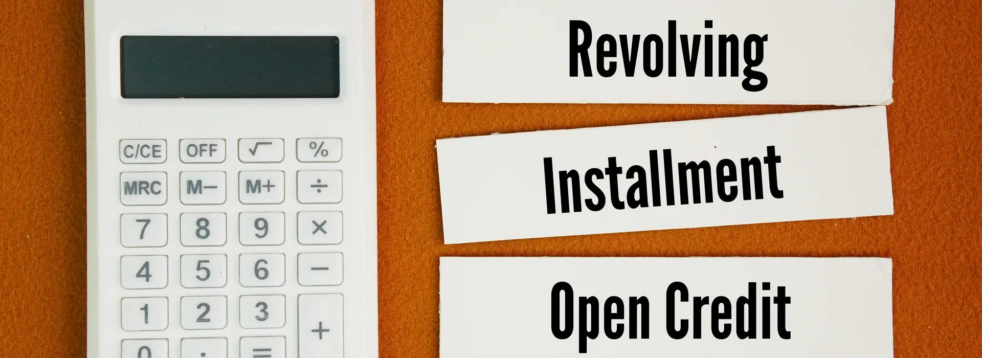 Revolving, installment, and open credit labels beside a calculator