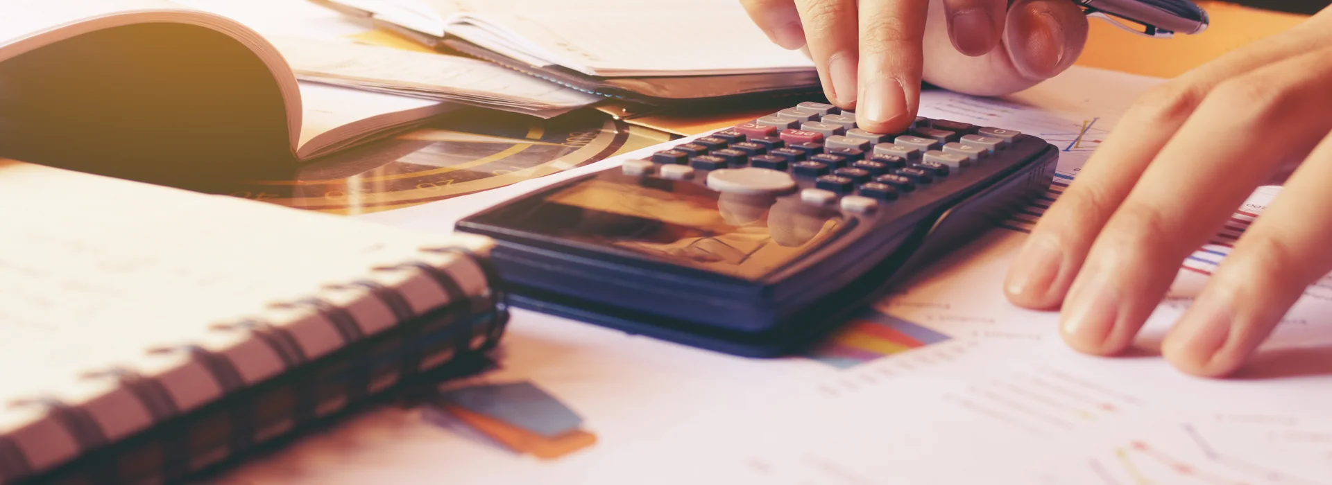 Woman calculating the original loan principal and payment amounts