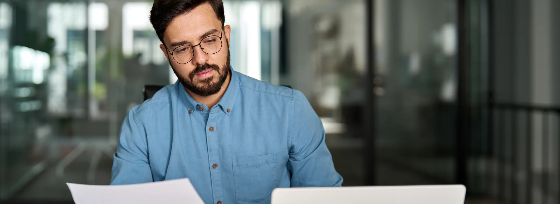 Person reviewing online loan documents on a laptop