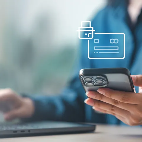 Person freezing a credit card through a mobile banking app