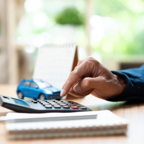 Calculator, coins, car model