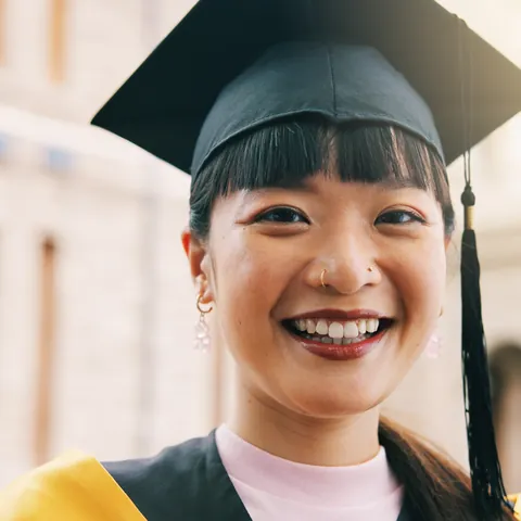 College student smiling on campus