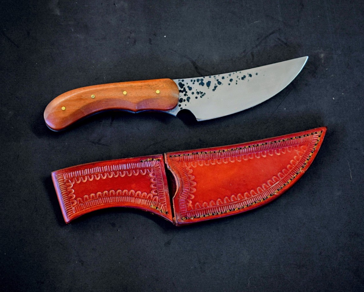 Inox Skinner - $200, Sheath: cowleather chased by hand.