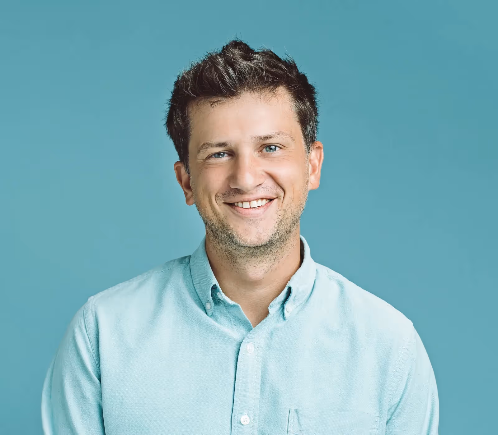 Headshot of Ross Hagan.