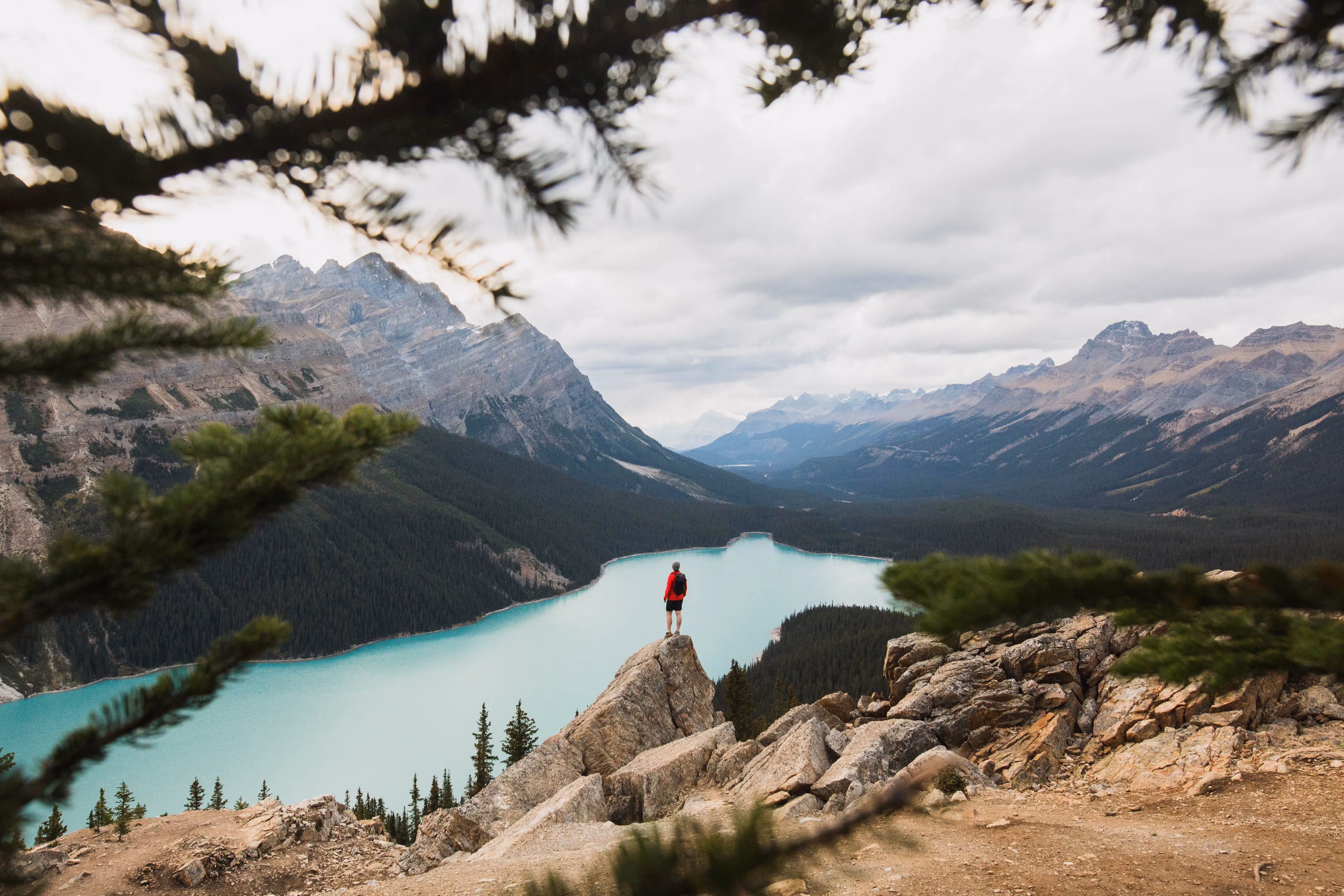 Landscape shot of a mountain with Jacob Wuertz in the center.