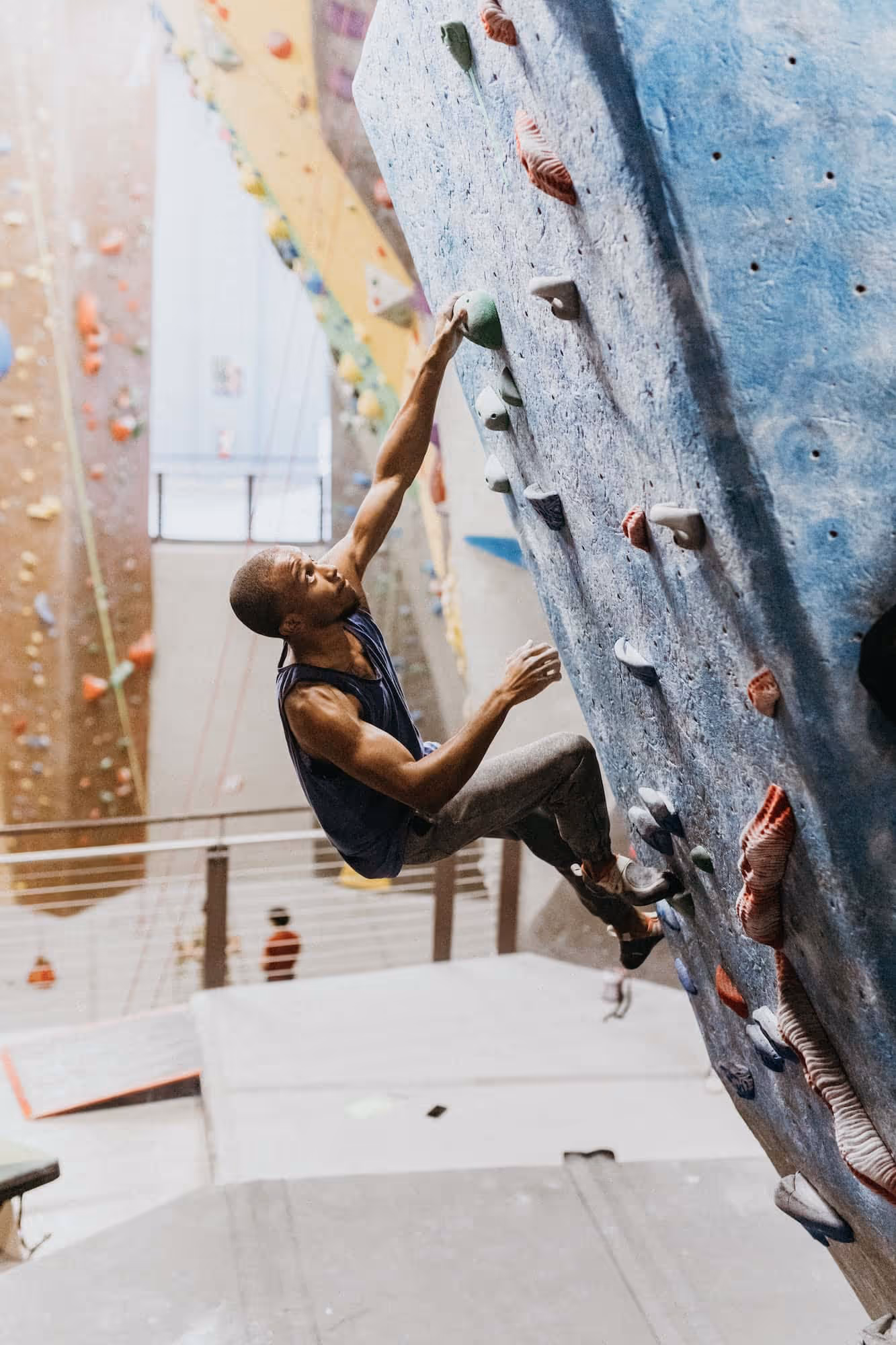 A man climbs an indoor wall at High Point Climbing in downtown Chattanooga.