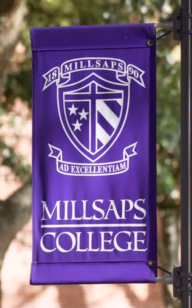 A post banner with the Millsaps Crest.