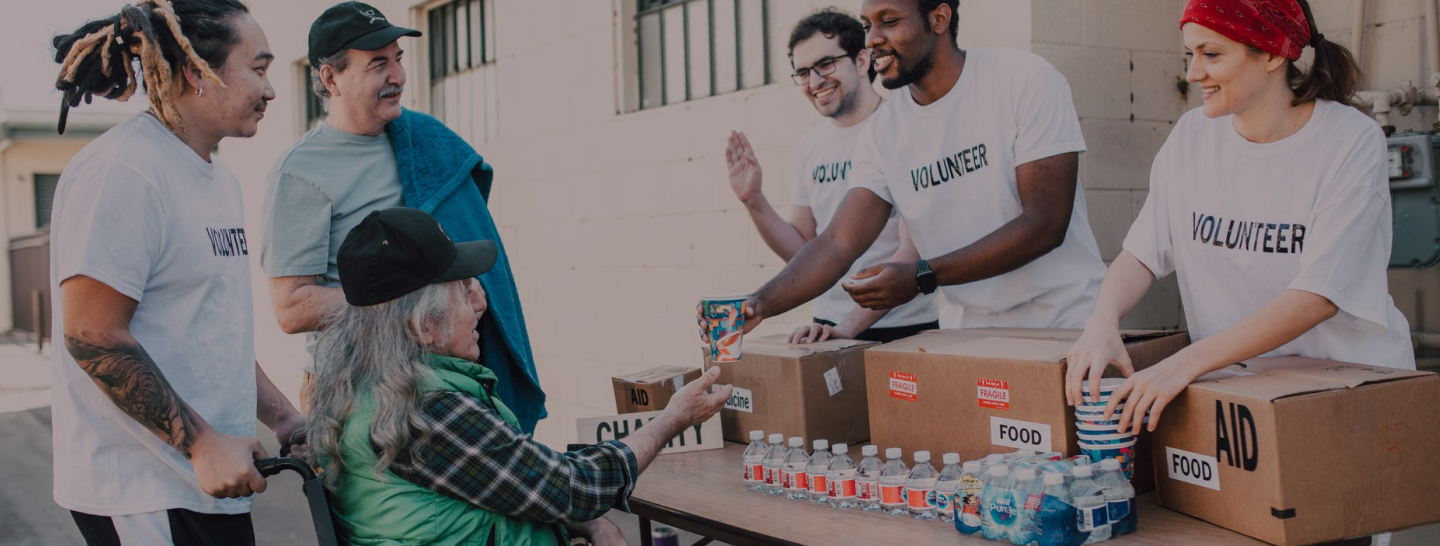 Photo of a group of people volunteering at a homeless shelter.