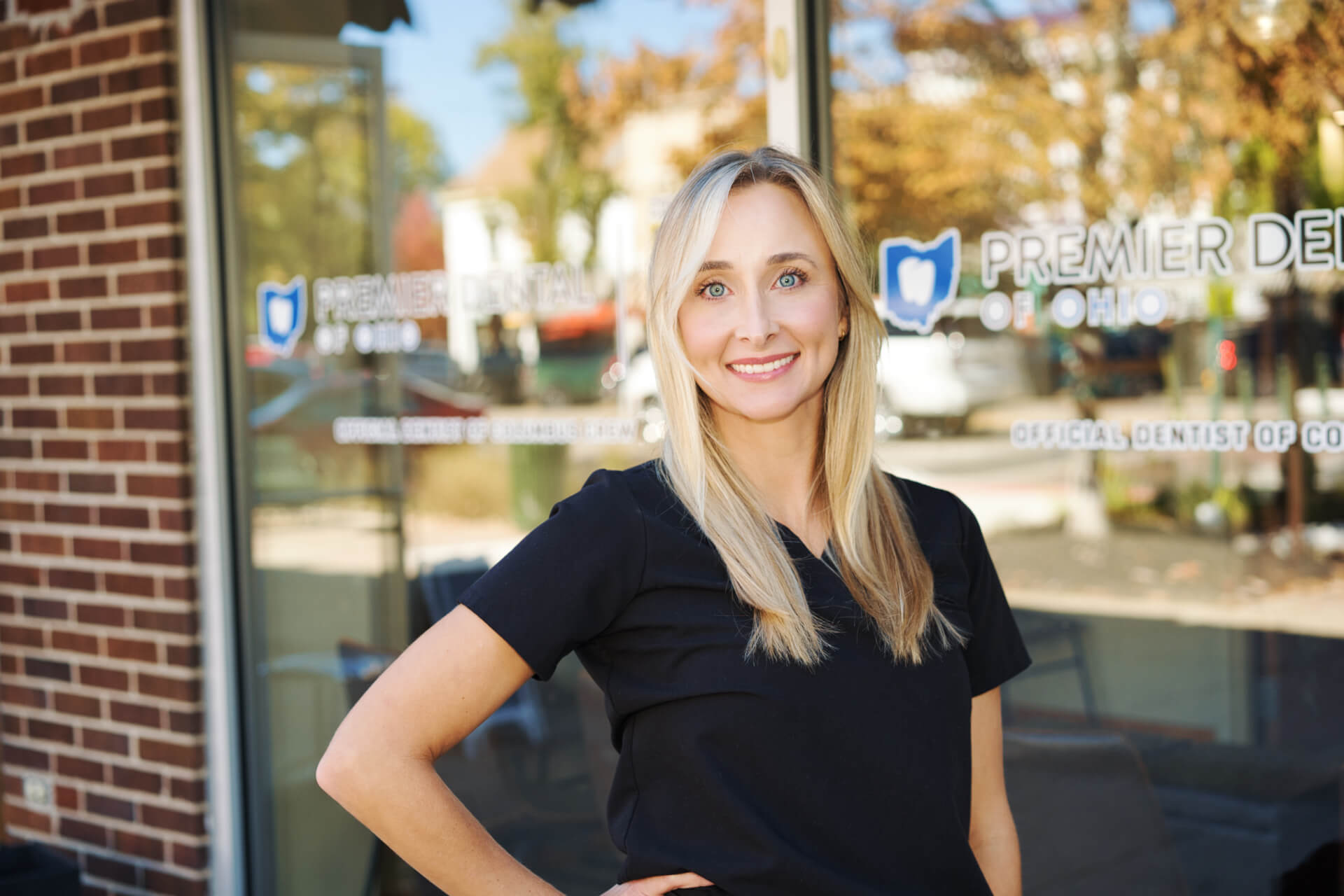 One of our hygienists cleaning finishing a dental cleaning with a patient