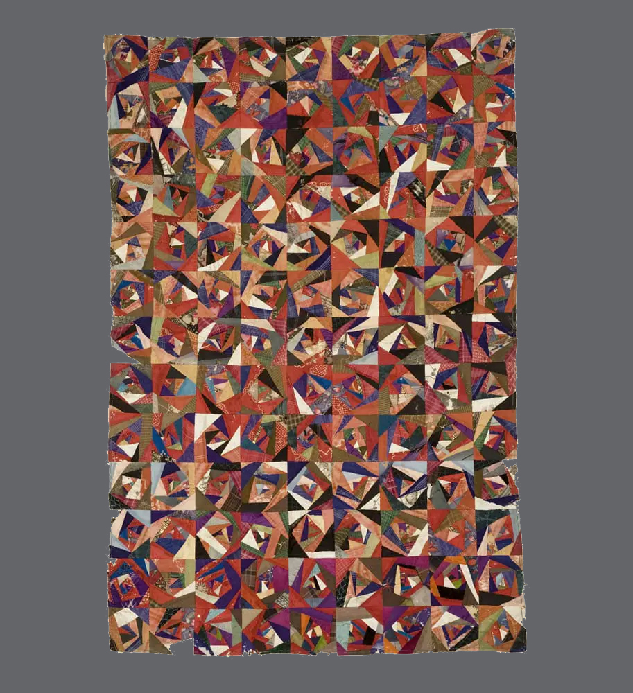 Late Edo to early Meiji period patchwork uchishiki made from colorful silk and wool garment fragments.