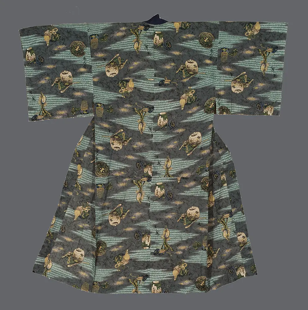 Man's mosurin cotton juban with a green collar and a grey-green print of traditional baskets, jars, and misty clouds.