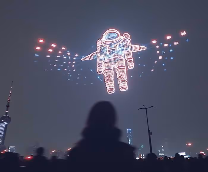 futuristic drone fireworks show showing an astronaut in Shanghai