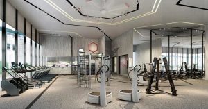 A gym with mirrors and exercise equipment 