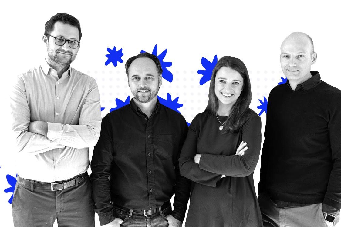 A group of people standing next to each other