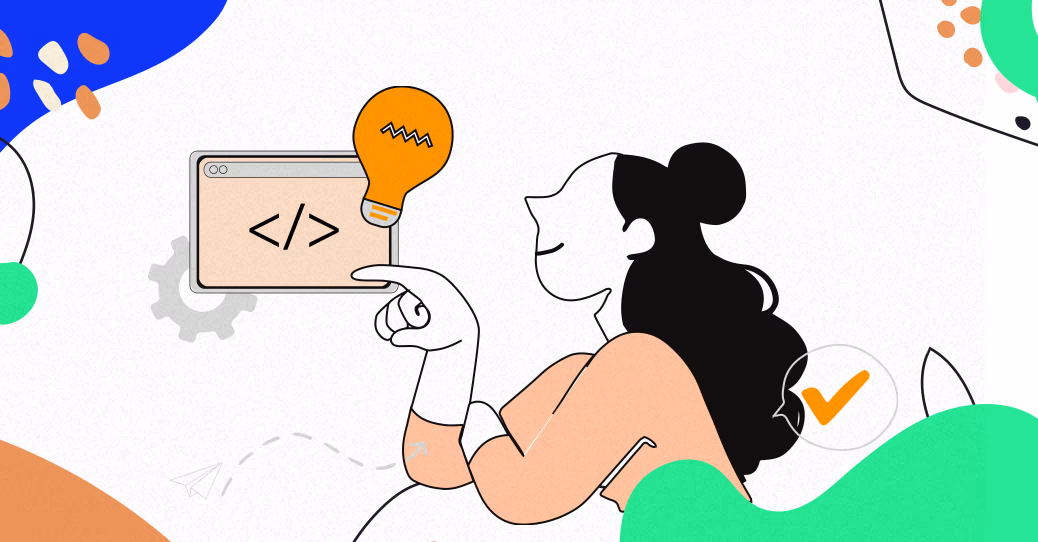 A woman holding a light bulb up to a computer screen