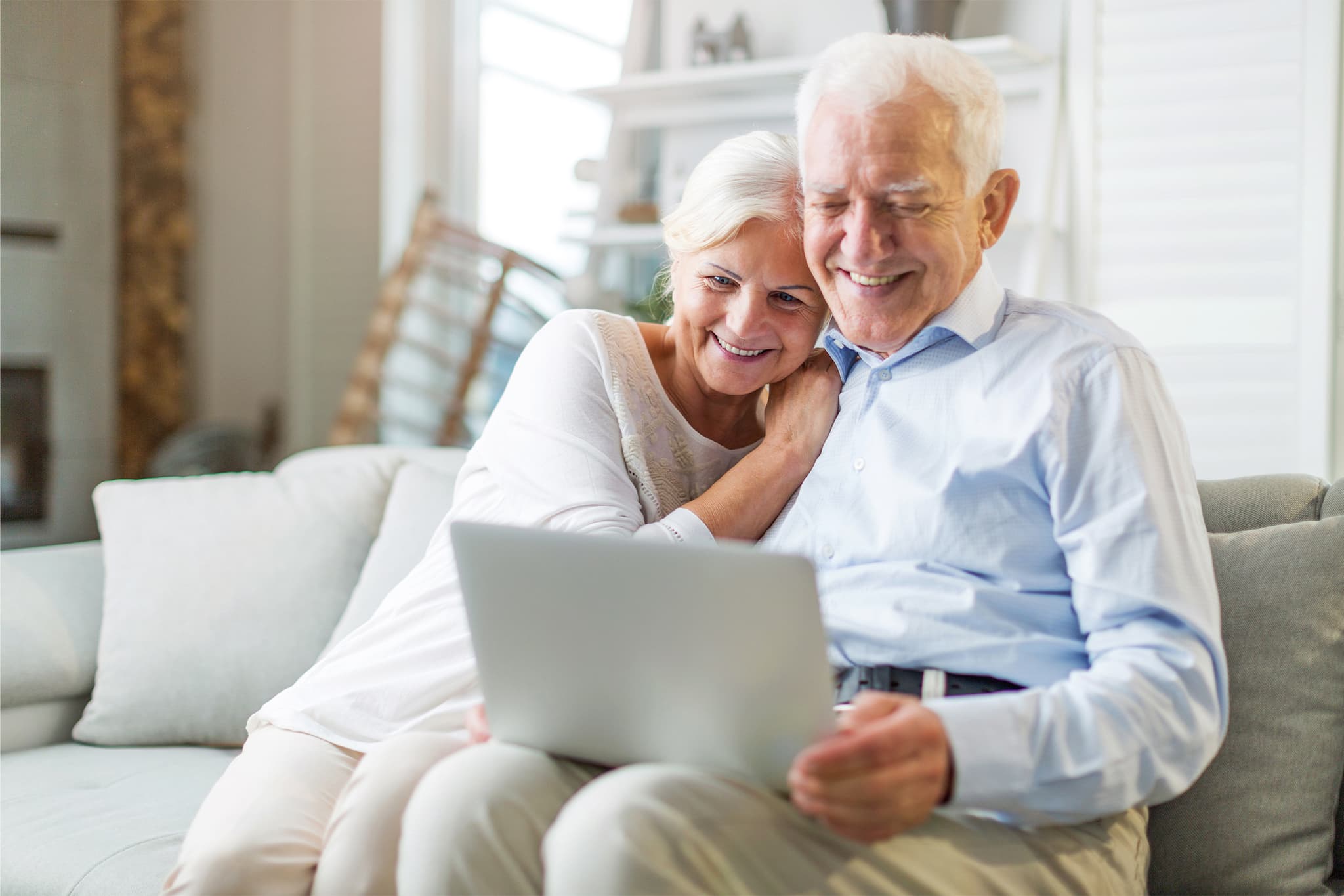 old couple sitting on couch