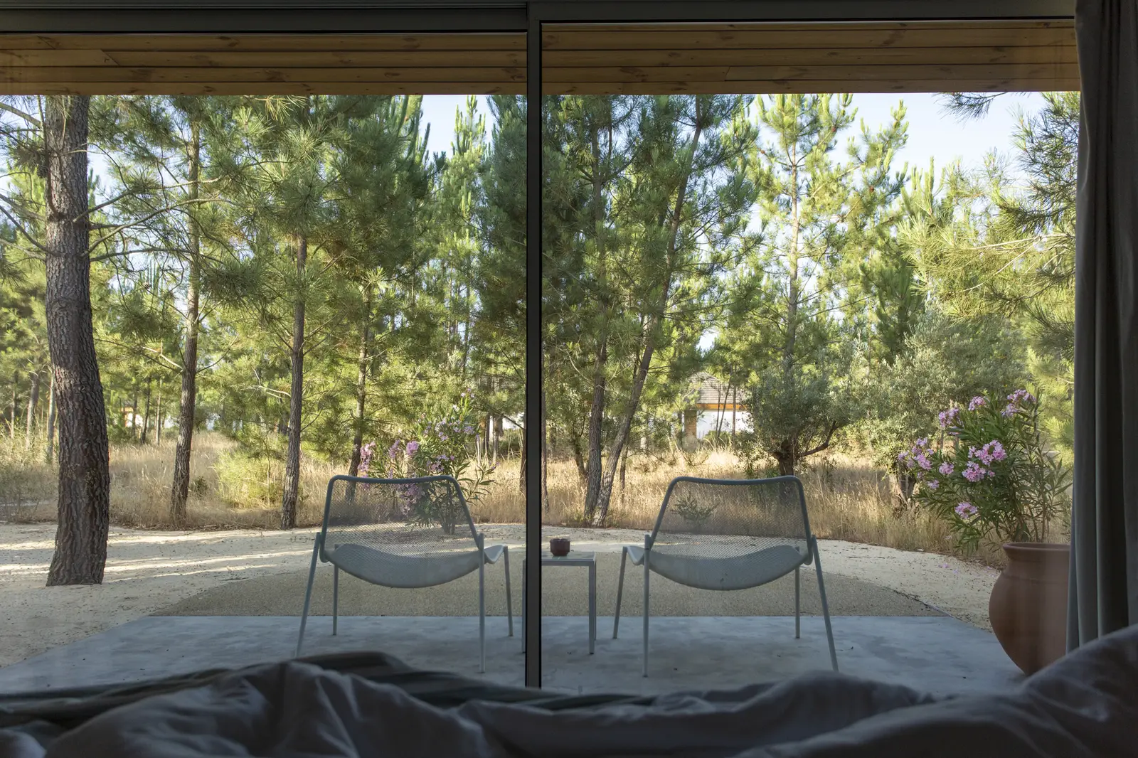 View from the bed in a cabana at Spatia Comporta, a five-star hotel retreat.