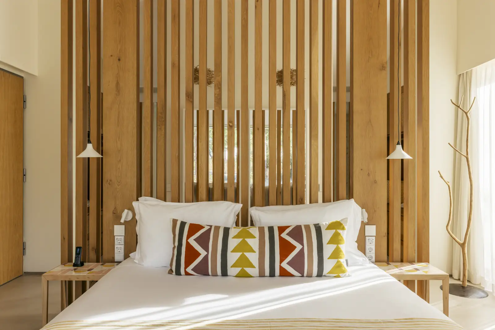 Bed at Spatia Comporta, a five-star hotel retreat.