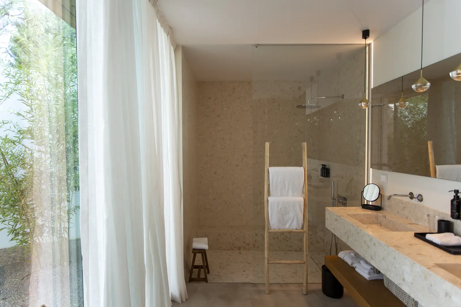 Spacious marble bathroom at Spatia Comporta, a five-star hotel retreat.