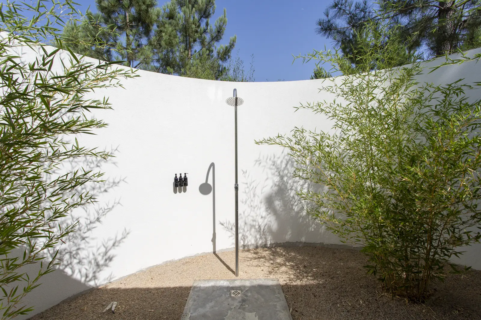 Cabana outdoor shower at Spatia Comporta, a five-star hotel retreat.