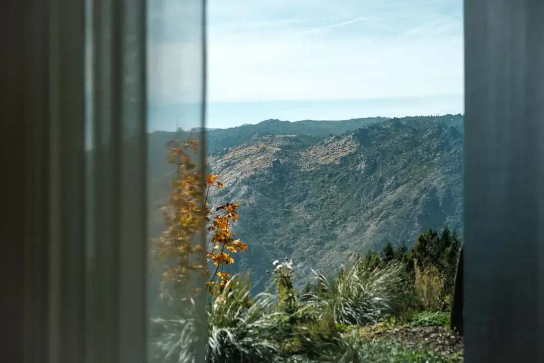 Mountain view from Casa de São Lourenço in Serra da Estrela, overlooking the rugged landscape — a highlight of boutique hotels in Serra da Estrela, Portugal.